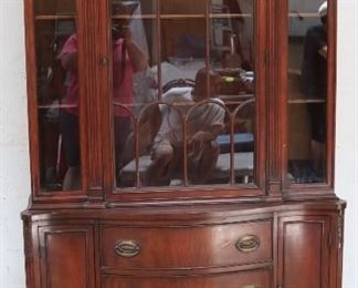 Bowed mahogany breakfront