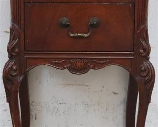 Carved mahogany stand