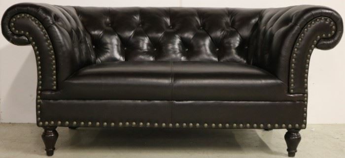Leather loveseat by Lazzaro