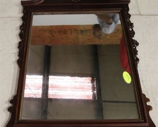 Hanging carved mahogany mirror