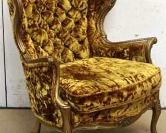 Vintage carved & tufted wing chair