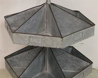 Rotating galvanized bin
