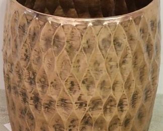 Copper toned trash bin
