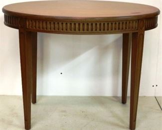 Oval table by Baker