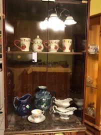 Curio cabinet, tea set,gravy bowls, tea cup and saucer