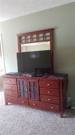 Flat screen TV on Dresser
