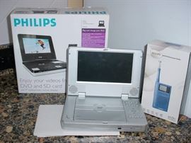 3-4 DVD portable players, old transistor radios, and much electronics