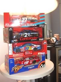 Several NASCAR cars, and other collectibles