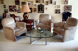 Leather occasional chairs, coffee table lamp table & lamp. Not the family pictures behind!!