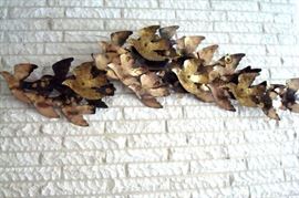 Metal wall hanging.