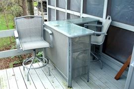 Heavy duty aluminum outdoor bar and chairs.