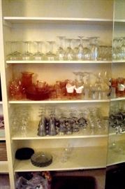 Stemware and pink Depression dishes