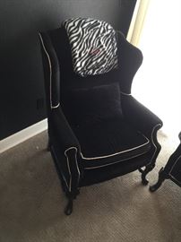 Or black velvet wing chairs