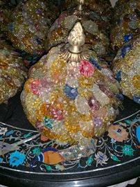10 Murano glass shades attach to large brass chandelier.