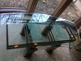 Fabulous curved glass desk on a heavy metal painted base. Eagle figures are etched into the glass top.