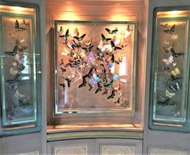 Framed butterflies. Largest measures 38 inches by 43 inches. Two side pieces measure 45 inches tall by 13 inches across.