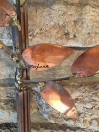 C. Jere tree wall sculpture.