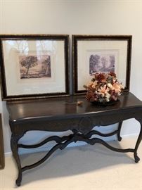 Console Table and Photographs with Floral Arrangement
