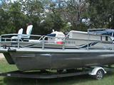 1999 Voyager, 75 hp motor, new seats last year, bait tanks, changing room, toilet and more includes trailer.