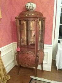 19th Century Upright Vitrene in the French Louis XV styling.