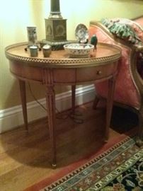 Pair of Fine End Tables by Baker in the Louis XVI Style with round fluted legs and a brass gallery.