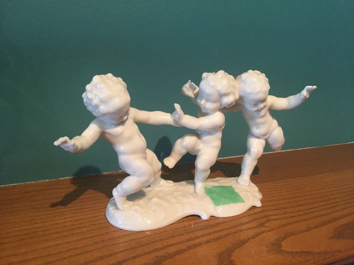 Porcelain three children playing
