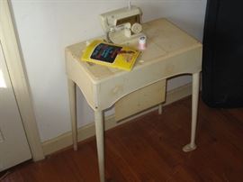 Toy Singer Sewing Machine in cabinet