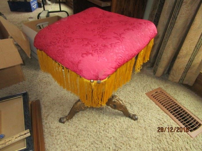 ANTIQUE PIANO STOOL WITH BRASS LEGS