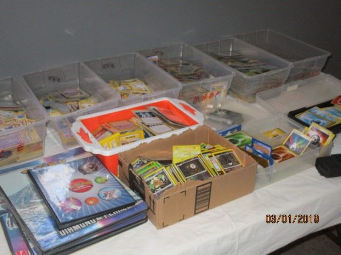 Pokemon card binders and books