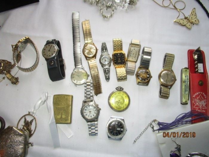 Several watches including Aristex, Bulova, Elgin pocket watch, Gruen, Fossil, Relic, Manual working Timex, etc