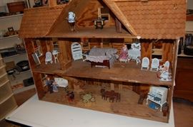 Vintage dollhouse with furniture
