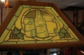 Miller Advertising at the end of the hanging light