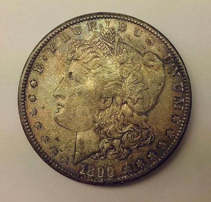 1890-S toned Morgan silver dollar. Not less than AU, scratch on eagles chest
 
