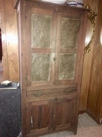 Antique punch tin cabinet