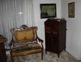 Oak settee and victrola