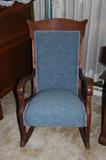 Oak upholstered rocking chair