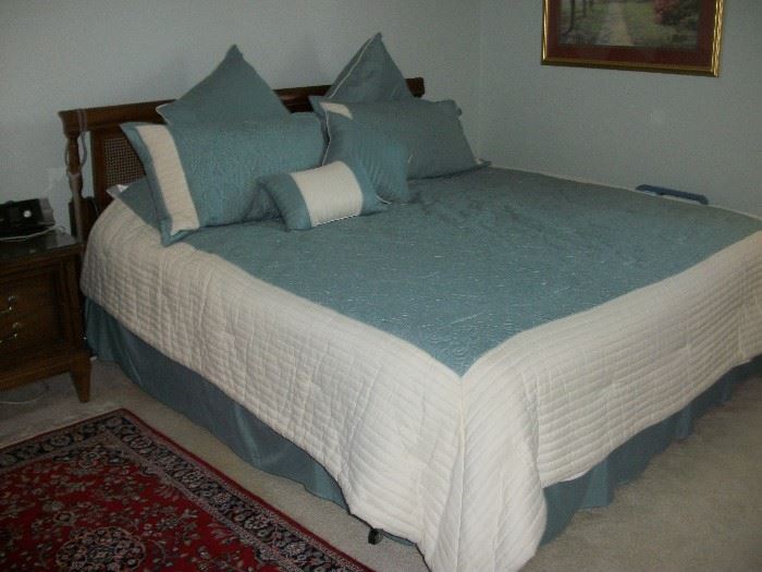 King headboard, 2 extra long twin mattresses that make a king bed.