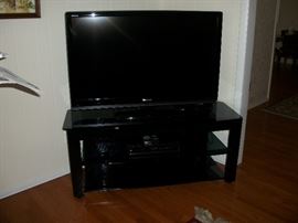 45' tv. On beautiful black stand.