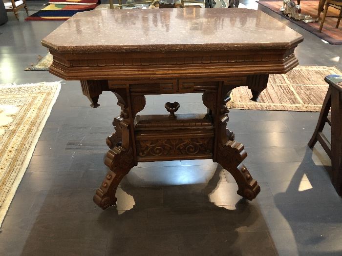 Hand carved wood table with marble top