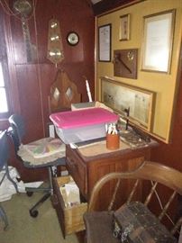 His office was upstairs in the book room...