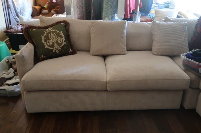 Crate & Barrel down couch. Retail price:  $5,600.00.  Estate Sales proce:  $900.00