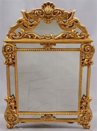 CARVED GILT WOOD WALL MIRROR, LATE 20TH C, H 57", W 38"  Lot 27