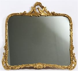 CARVED GILT WOOD AND GESSO MIRROR, H 33", W 39"  Lot 2269