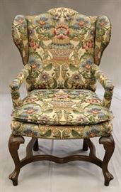 BAKER CARVED WALNUT WING CHAIR, H 42", L 27", D 32"  Lot 2424