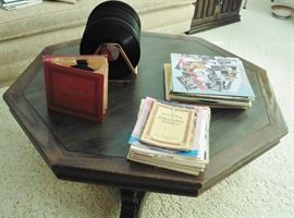 Hexagonal coffee table with wrought iron accent; records: 45's, 78's, LP's. Sheet music