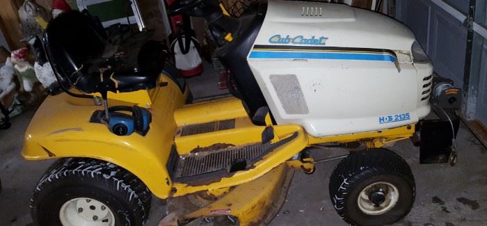 Cub Cadet HDS 2130 - sold with chains, plow and has winch on front. Has not been started in more than 2 years, needs battery. Owner used for plowing driveway