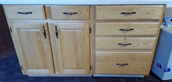 Oak Sink Base and 4 Drawer base cabinets with counter top