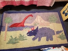 Childrens knitted wool dinosaur rug