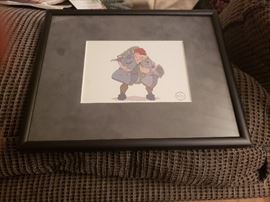 Set of 2 Walt Disney artwork prints.