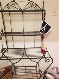 Sturdy dark metal decorative kitchen rack. Great for storage, keeping kitchen towels organized, recipe books, etc. 